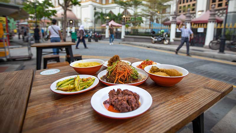 SHOT OF NASI PADANG DISHES IN KAMPONG GELAM